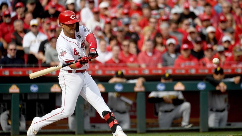 CINCINNATI, OHIO - MARCH 28: Jose Iglesias #4 of the Cincinnati Reds hits the ball for a double during the second inning on Opening Day between the Pittsburgh Pirates and the Cincinnati Reds at Great American Ball Park on March 28, 2019 in Cincinnati, Ohio. (Photo by Bobby Ellis/Getty Images)