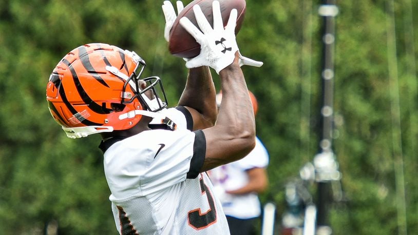 Bengals’ rookie running back Quinton Flowers catches a pass during organized team activities Tuesday, May 22 at the practice facility near Paul Brown Stadium in Cincinnati. NICK GRAHAM/STAFF