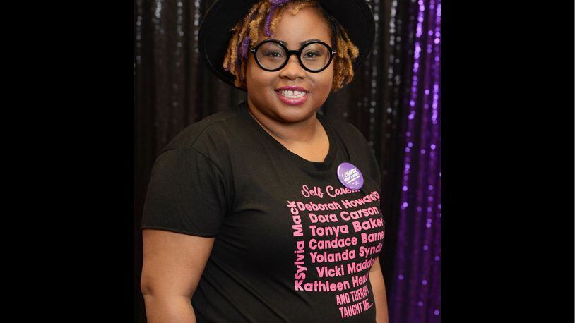 Ashley Browning is the founder of SoLoved, a community organization. She is pictured at Self Care Ain't Selfish Women of Color Symposium. The event was  hosted by SoLoved, No More Pain and No More Blows.