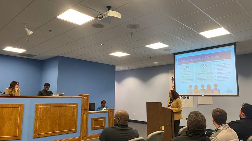 Monica Santana Rosen, CEO of the Alma Group, who is conducting the search for the next DPS superintendent, presents at a DPS meeting Tuesday. Eileen McClory / staff