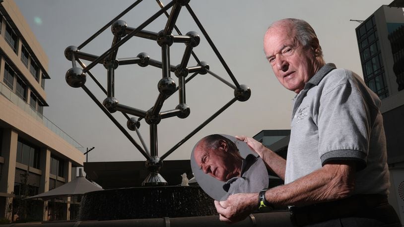 Jacques Beaudouin’s long quest to commemorate the birthplace of Silicon Valley, William Shockley’s Bell Lab location in Mountain View, Calif., is finally being realized as he poses with a silicon wafer next to a sculpture of a silicon molecule at the Village of San Antonio Center, Tuesday, Aug. 7, 2018. (Karl Mondon/Bay Area News Group/TNS)