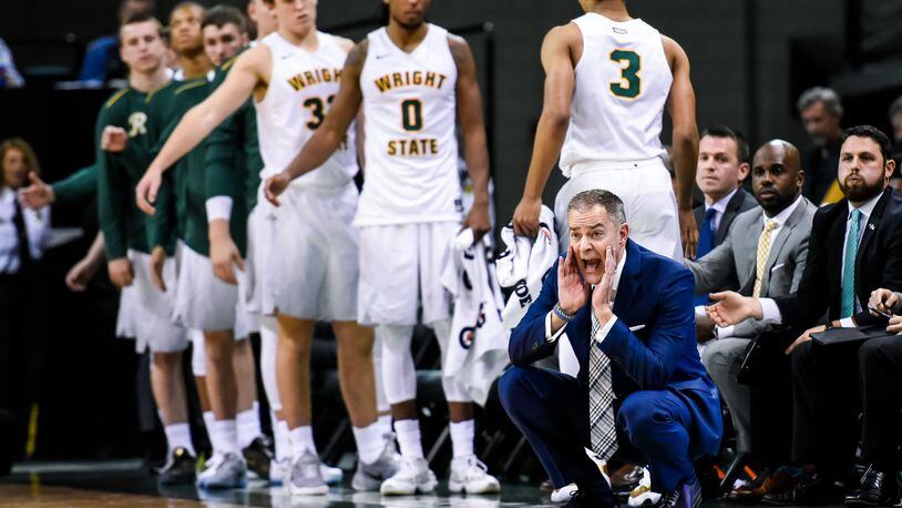 Wright State University head men’s basketball coach Scott Nagy signals to his team from the sideline during their game against Miami University Tuesday, Nov. 15 at the Nutter Center at Wright State University in Fairborn. NICK GRAHAM/STAFF