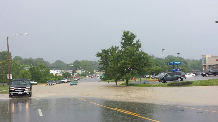 Flash floods submerge cars, roadways