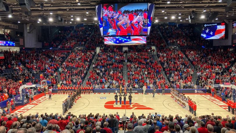 The scene at UD Arena as Dayton and Illinois-Chicago stand for the national anthem on Tuesday, Nov. 9, 2021, at UD Arena. David Jablonski/Staff