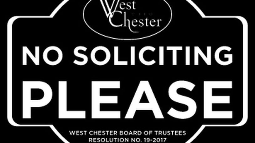 West Chester Twp. has passed new restrictions on door-to-door vendors and is offering free decals alerting solicitors not to knock.