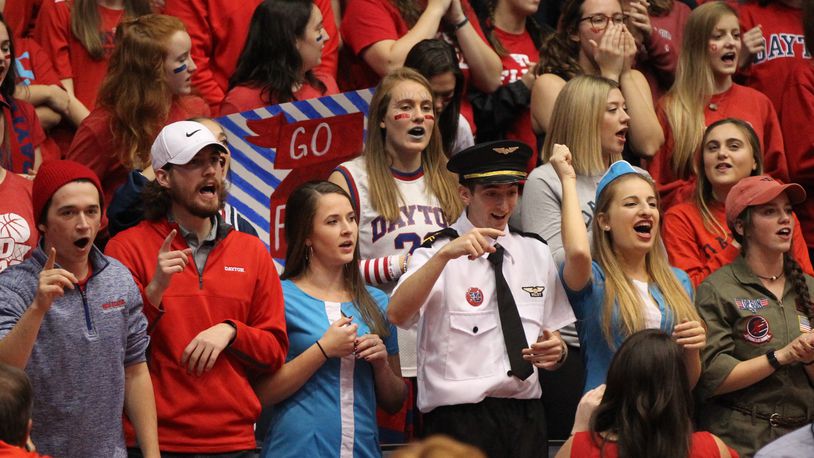 Fans in the Dayton student section cheer during an exhibition game against Capital on Friday, Nov. 2, 2018, at UD Arena. David Jablonski/Staff