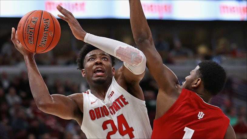CHICAGO, ILLINOIS - MARCH 14: Andre Wesson #24 of the Ohio State Buckeyes tries to get off a shot against Aljami Durham #1 of the Indiana Hoosiers at the United Center on March 14, 2019 in Chicago, Illinois. Ohio State defeated Indiana 79-75. (Photo by Jonathan Daniel/Getty Images)
