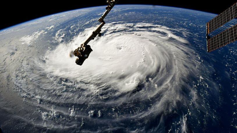 In this NASA handout image taken by Astronaut Ricky Arnold, Hurricane Florence gains strength in the Atlantic Ocean as it moves west, seen from the International Space Station on Monday. (Photo by NASA via Getty Images)