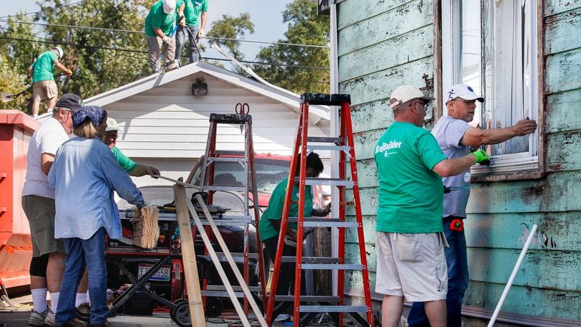 Volunteers from Shiloh Church work Thursday, Sept. 19, 2019, to help Jessica Brady’s house in Harrison Twp. The rebuilding project is the first tornado-damaged home to be repaired through a partnership of non-profit organizations formed following the Memorial Day natural disaster. CHRIS STEWART / STAFF