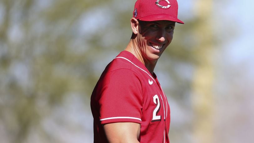 Cincinnati Reds relief pitcher Michael Lorenzen (21) smiles at the conclusion of a bullpen session, Monday, Feb. 17, 2020, at the baseball team’s spring training facility in Goodyear, Ariz. (Kareem Elgazzar/The Cincinnati Enquirer via AP)