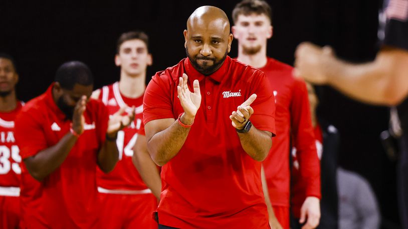 Miami University's head coach Jack Owens cheers on his team during their basketball game against University of Cincinnati Wednesday, Dec. 1, 2021 at Millett Hall. JN FILE PHOTO