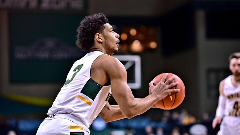 Wright State’s Mark Hughes lines up a shot during Tuesday’s game vs. IUPUI at the Nutter Center. Joseph Craven/CONTRIBUTED