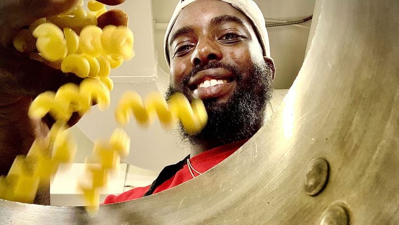 Chef Darion Lewis, prepares to make his delicious macaroni and cheese Tuesday Sept. 20, 2022. MARSHALL GORBY\STAFF
