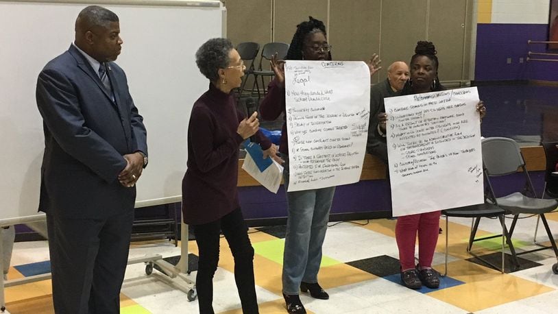 Each small group at the NAACP Town Hall meeting presented its concerns about Dayton Public Schools to the whole crowd on Monday, Jan. 22, 2018, at Dayton Boys Prep School. JEREMY P. KELLEY / STAFF