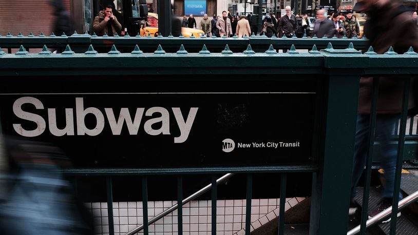 A 60-year-old woman said a man punched her in the face on a New York subway when she asked him to move his bag so she could sit.