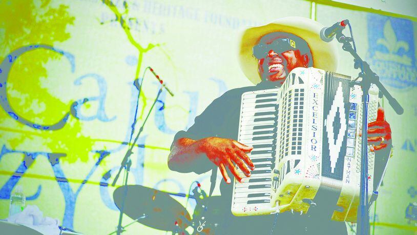 Musician at the Louisiana Cajun-Zydeco Festival in New Orleans. (Courtesy of New Orleans CVB/TNS)