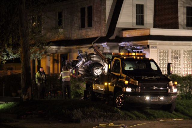 Car goes airborne, crashes into porch of Dayton home