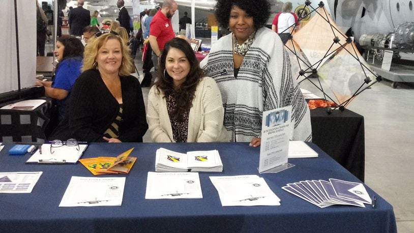 88th Force Support Squadron’s Workforce Element assists with a pre-COVID educational fair event held Oct. 24, 2019, at the National Museum of the U.S. Air Force. The team is now ramping up for the CY21 Mentoring Program at Wright-Patterson Air Force Base and is especially interested in mentors for it. Starting at left are Tammi Dyson and LeAnna Gorman, management analysts; and Sherita Smith, human resources specialist. Contributed photo