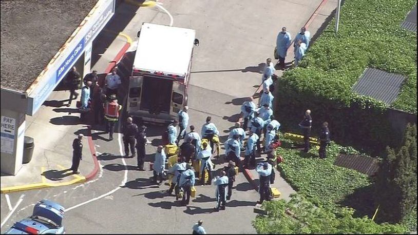 Seattle Fire Department officials at the scene of a reported shooting in Seattle.