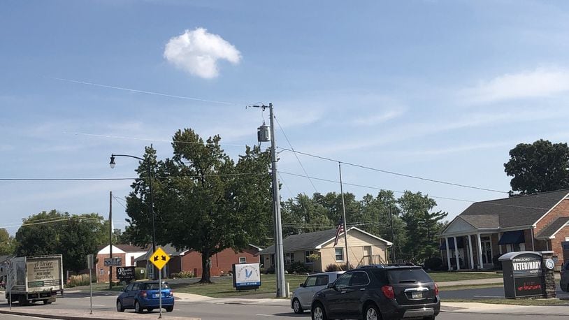 These properties on Central Avenue in Springboro are expected to be in greater demand if they are included in urban village zoning for 62 acres at the city’s center. STAFF/LAWRENCE BUDD