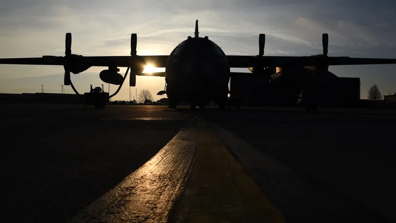 The sun rises over the flightline at the 179th Airlift Wing, Mansfield, Ohio, casting its morning glow on the C-130H Hercules on Dec. 28, 2016.  (U.S. Air National Guard photo by Airman Megan Shepherd/Released)