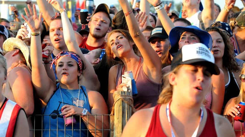 Fans enjoy a performance during the annual Country Concert at Hickory Hill Lakes in Ft. Loramie this July. DAVID A. MOODIE/CONTRIBUTED