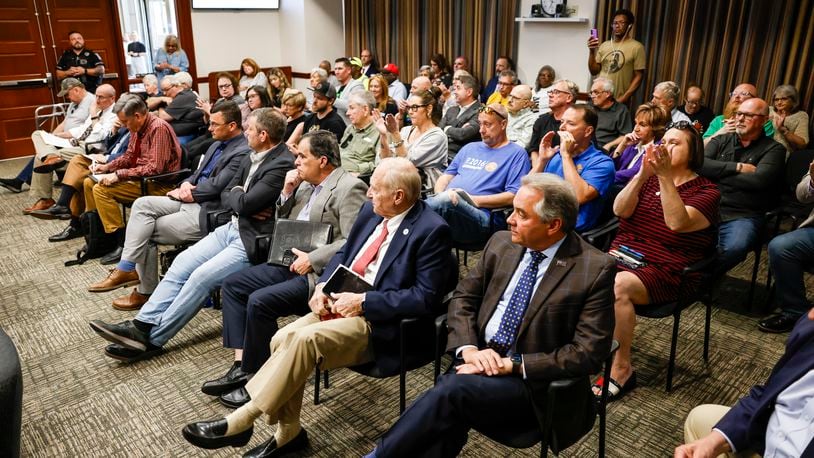 A crowd of about 100 gathered for a special Hamilton city council meeting to discuss the Miami Conservancy District assessment increase Thursday, April 18, 2024 in Hamilton. NICK GRAHAM/STAFF