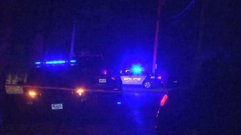 Police investigate on Thursday, May 9, 2019, after a 14-year-old boy was found dead after an apparent dog mauling in Dighton, Massachusetts.