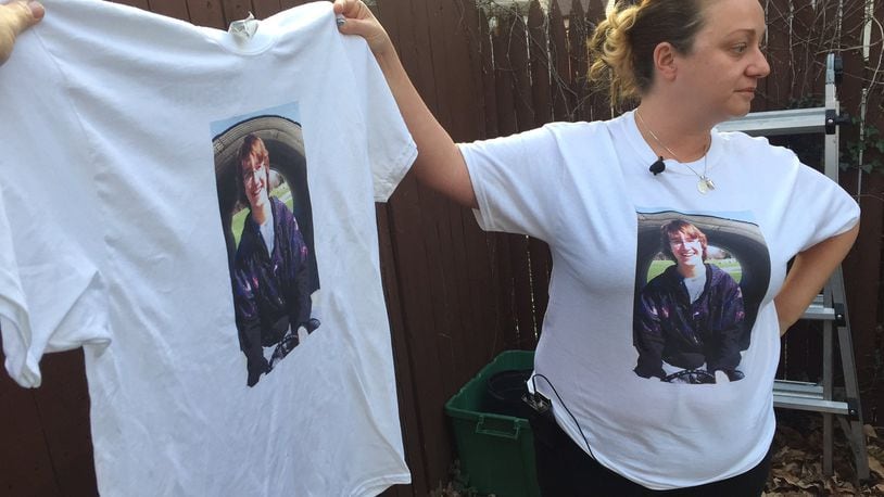 Jessica Combs, mother of Ronnie Bowers, holds a T-shirt with her son’s photo. NATALIE JOVONOVICH / STAFF
