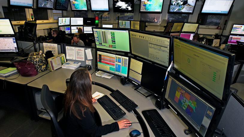 In this 2016 file photo, a Butler County dispatcher works in the Butler County Sheriff’s dispatch center. Some government officials in Butler County have said they were taken by surprise when learning it will cost $19.2 million to replace emergency communication equipment. NICK GRAHAM/STAFF