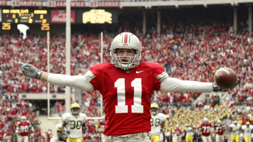 ** FILE ** Ohio State wide receiver Anthony Gonzalez celebrates his 68 yard touchdown reception from quarterback Troy Smith against Michigan at Ohio Stadium in Columbus, Ohio, in this Nov. 20, 2004 file photo. Top-ranked Ohio State takes on No. 2 Michigan on Saturday, Nov. 18, 2006 in Columbus. (AP Photo/Jay LaPrete)