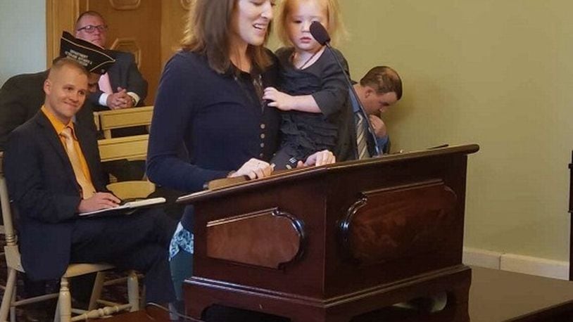 Brianna McKinnon of Dayton testified before members of the Ohio House about a bill she worked on with then-Rep. Rick Perales, R-Beavercreek, in this 2019 photo. The bill granted temporary professional licenses to members of the military and their spouses.