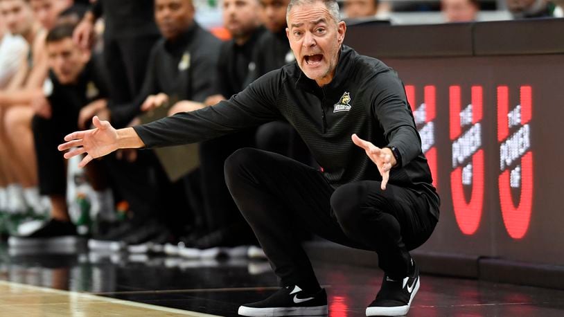 Wright State head coach Scott Nagy shouts instructions to his team during the second half of an NCAA college basketball game against Louisville in Louisville, Ky., Saturday, Nov. 12, 2022. Wright State won 73-72. (AP Photo/Timothy D. Easley)