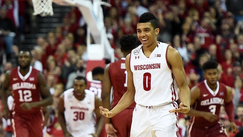 MADISON, WI - DECEMBER 03:  D'Mitrik Trice #0 of the Wisconsin Badgers reacts after a three point shot during the second half of a game against the Oklahoma Sooners at the Kohl Center on December 3, 2016 in Madison, Wisconsin.  (Photo by Stacy Revere/Getty Images)