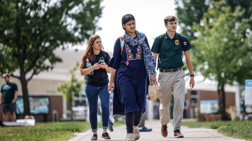 Wright State University students walk to class Wednesday September 14, 2022. Wright State University and Central State are collaborating on a semiconductor lab. JIM NOELKER/STAFF