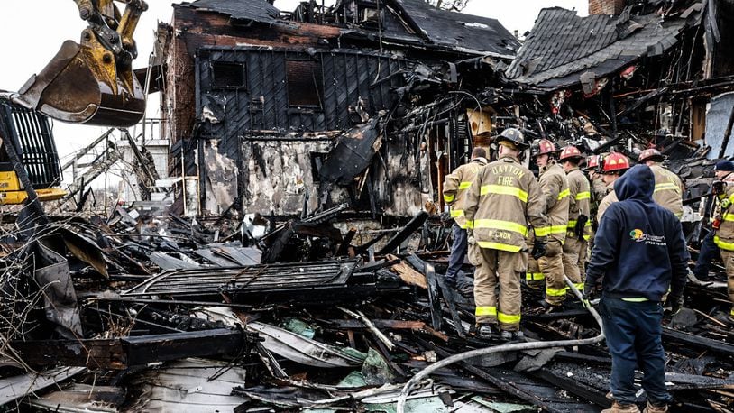 The bodies of five people were discovered in heavy debris in the aftermath of a large fire Wednesday morning, March 8, 2023, at a vacant house in the 500 block of North Broadway Street in Dayton. JIM NOELKER/STAFF