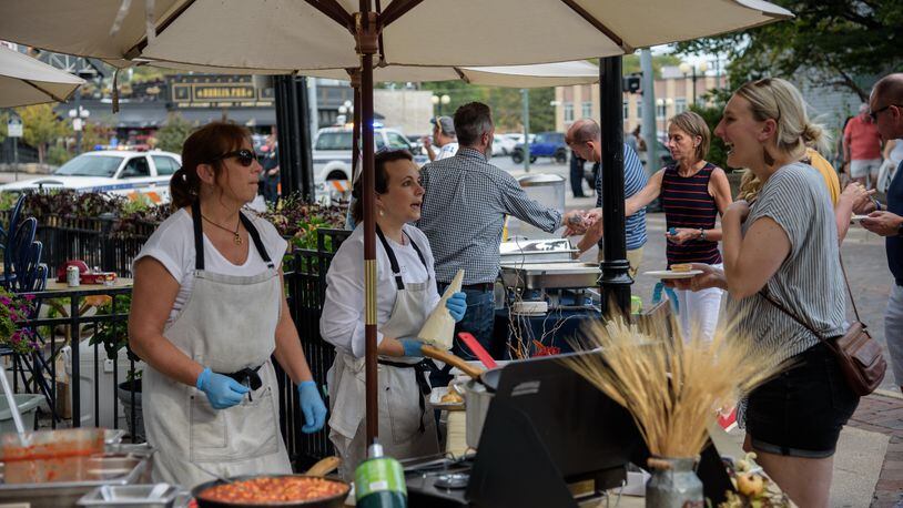Snack and sip your way through the Oregon District in downtown Dayton on Saturday, Sept. 16 from noon to 6 p.m. with the return of its signature tasting event. TOM GILLIAM / CONTRIBUTING PHOTOGRAPHER