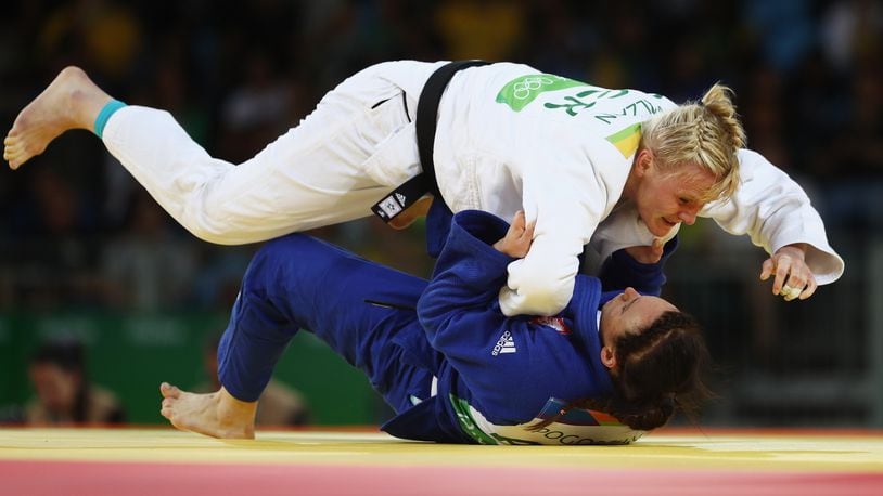 RIO DE JANEIRO, BRAZIL - AUGUST 11: Kayla Harrison of the United States competes against Zhehui Zhang of China during the women’s -78kg elimination round judo contest on Day 6 of the 2016 Rio Olympics at Carioca Arena 2 on August 11, 2016 in Rio de Janeiro, Brazil. (Photo by Julian Finney/Getty Images)