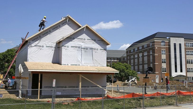 The University of Dayton is poised to launch a two-year, $17 million construction and renovation project in the off-campus student neighborhood. This includes building several new student apartments and renovating existing university-owned apartment complexes that house students. One new house is framed and the concrete slab for another is being completed on Stonemill Road.