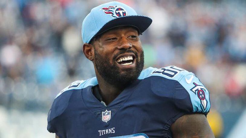 Tennessee Titans tight end Delanie Walker (82) smiles after a Titan's touchdown during an NFL football game against the Houston Texans, Sunday, Dec. 3, 2017, in Nashville, Tenn. (Austin Anthony/Daily News via AP)
