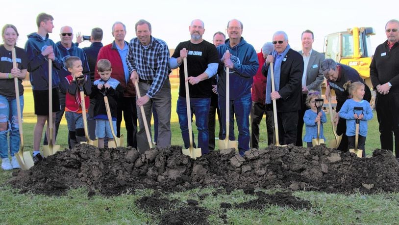 Members of University Baptist Church and local dignitaries break ground on an 18,000-square foot expansion at the church, expected to be completed by over 1,000 volunteers this summer. CONTRIBUTED PHOTO
