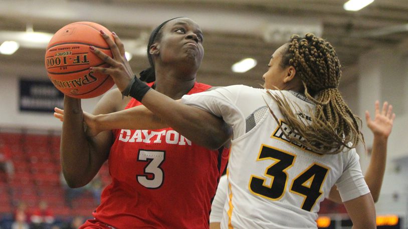 Dayton's Brittany Ward, left, is fouled by Virginia Commonwealth's Nyra Williams in the semifinals of the Atlantic 10 tournament on Saturday, March 9, 2019, at the A.J. Palumbo Center in Pittsburgh.