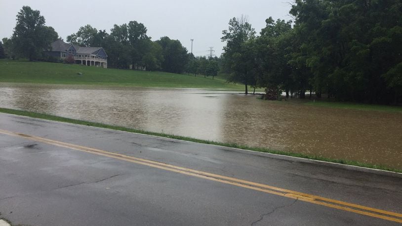 Flooding occurred on Tipp City’s Canal Road on Thursday afternoon. Miami County was one of six local counties to experience flood warnings on Thursday.