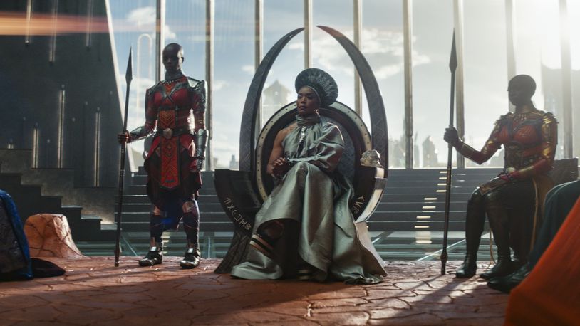 This image released by Marvel Studios shows, from left,  Dorothy Steel as Merchant Tribe Elder, Florence Kasumba as Ayo, Angela Bassett as Ramonda, and Danai Gurira as Okoye in a scene from "Black Panther: Wakanda Forever." (Marvel Studios via AP)