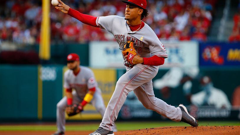 ST. LOUIS, MO - SEPTEMBER 1: Luis Castillo #58 of the Cincinnati Reds pitches against the St. Louis Cardinals in the first inning at Busch Stadium on September 1, 2018 in St. Louis, Missouri.  (Photo by Dilip Vishwanat/Getty Images)