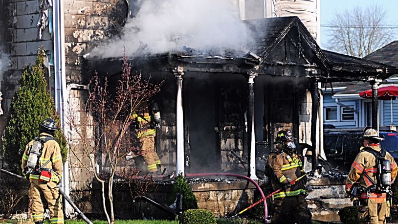 Fire erupts at Tipp City house - Marshall Gorby/STAFF