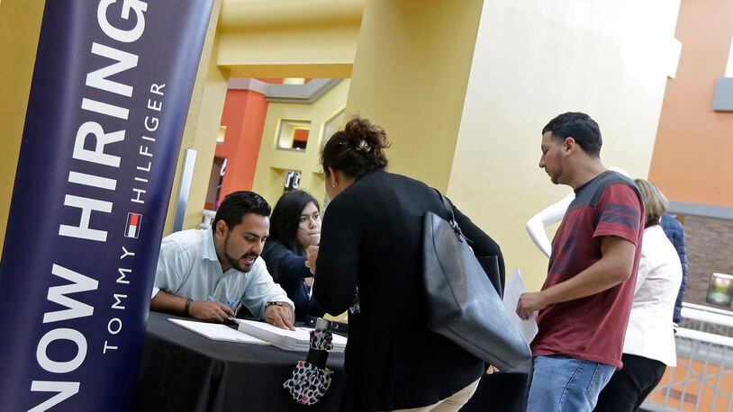 Ohio saw unemployment fall slightly in March, according to the latest state jobs report. AP Photo/Alan Diaz, File