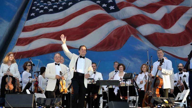 Keith Lockhart and the Boston Pops perform at Boston Pops On Nantucket Hosted By Real Simple and Coastal Living at Jetties Beach on August 9, 2014 in Nantucket, Massachusetts.