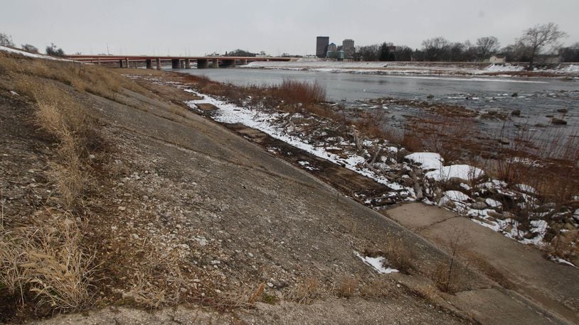 Deteriorated concrete on the Greater Old North Dayton levee will be replaced in three locations, including here across from Kettering Field, primarily through a $1.1 million federal grant. CHRIS STEWART / STAFF