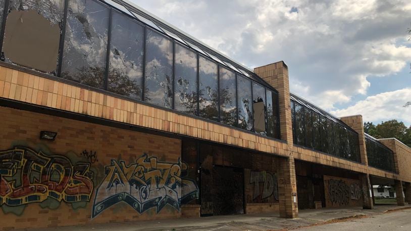 The old Kroger at 900 N. Gettysburg Ave. has been purchased by SugarCreek, a food manufacturer that employs more than 475 workers in Dayton. The eyesore will be renovated and reused, more than a decade after the grocery store closed down. CORNELIUS FROLIK / STAFF